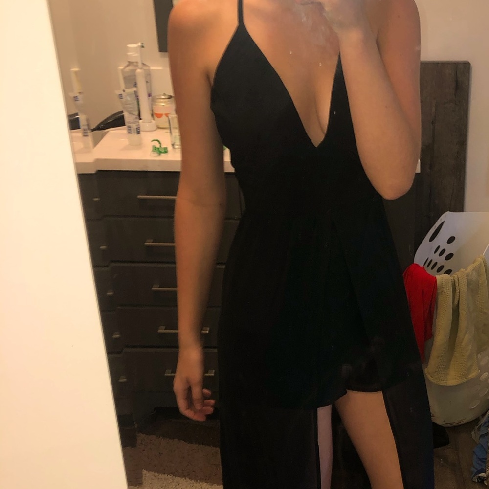 Black dress. Open front. Shorts on inside. Dress around